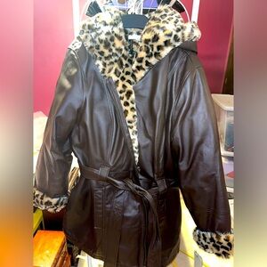Wilson’s brown leather women’s coat/animal print faux fur lining. New with tags.
